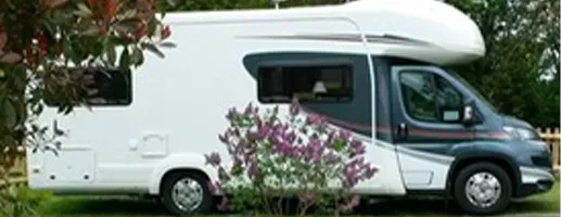 A motorhome parked on a Rosebay touring pitch